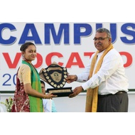 Student receiving Meadls and Award