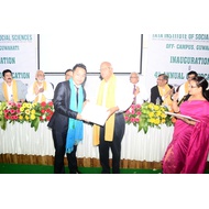 Student receiving degree certificate