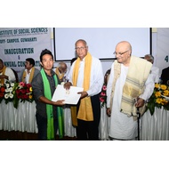 Student receiving degree certificate