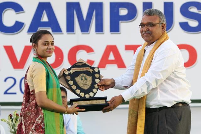Student receiving Meadls and Award