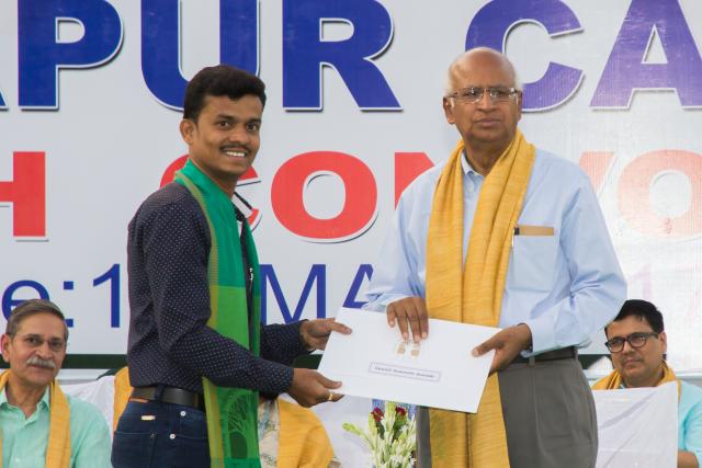 Student receiving degree Certificate